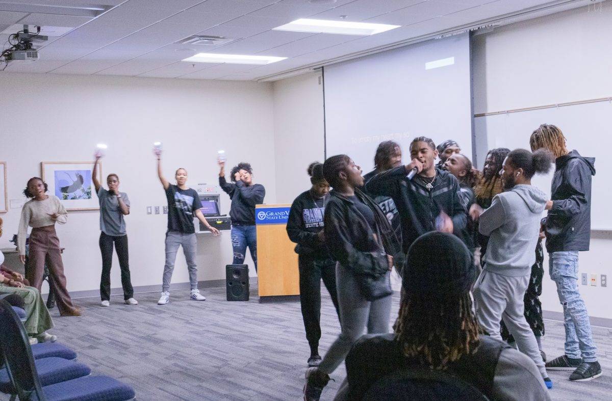 Members of Black Student Union singing and cheering